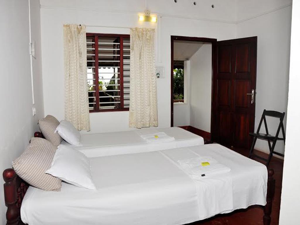 Angeo Beach House Alappuzha Bagian luar foto